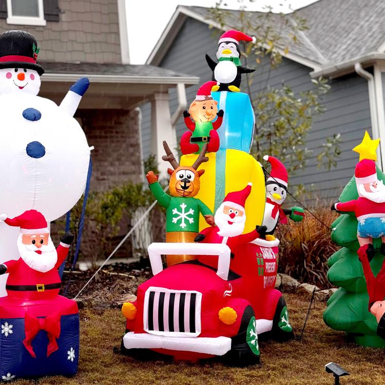Inflatable Santa gift car yard decoration with penguin top and festive characters