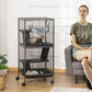 Rolling small pet habitat cage with multi-level ramps, hammock, and removable tray