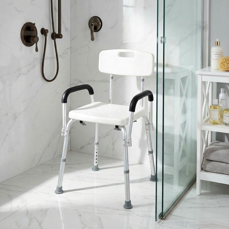 Bath shower chair with white seat and backrest and black curved armrests