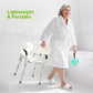 Lightweight portable shower chair with white seat and backrest and black armrests