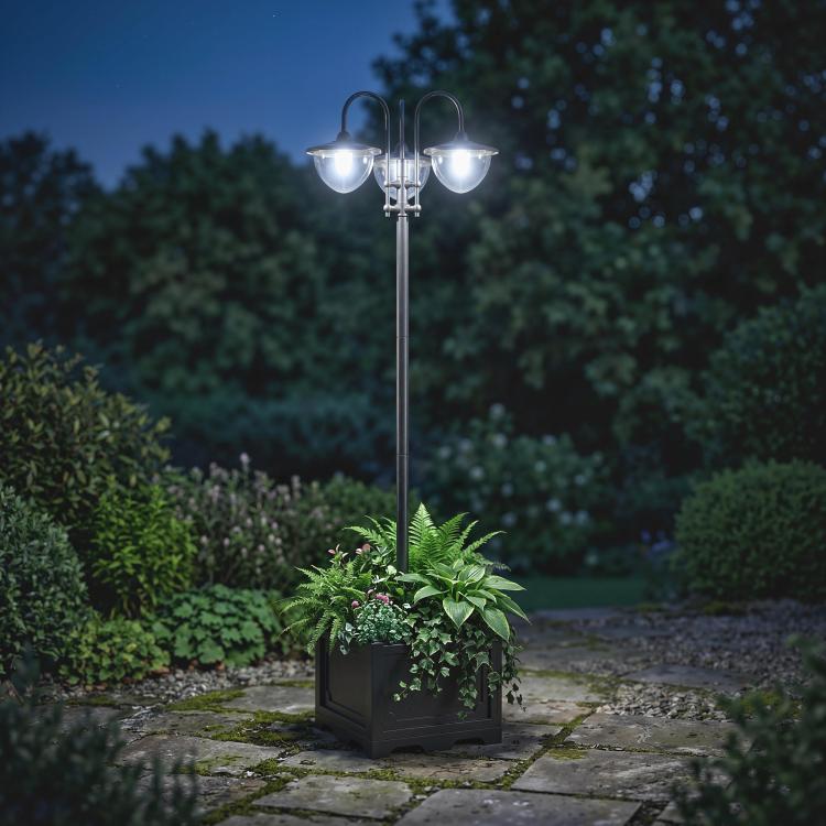 Solar lamp post light with three glass lantern heads and planter base, black