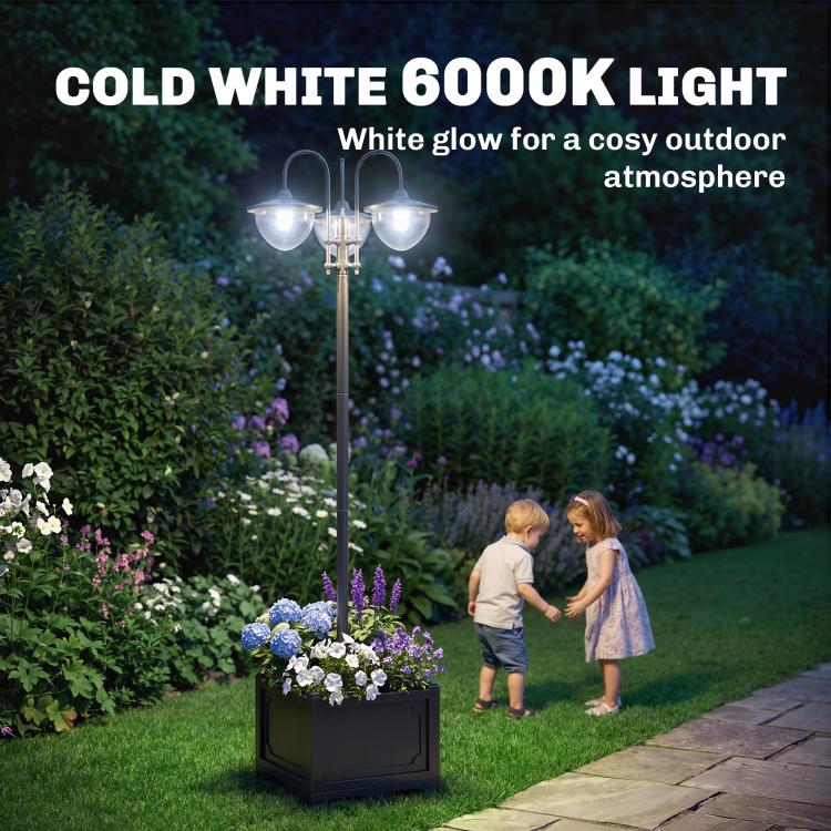 Three-head solar lamp post light with glowing frosted glass shades and flower planter