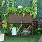 Brown rattan-style wicker elevated planter box with black metal base shelf