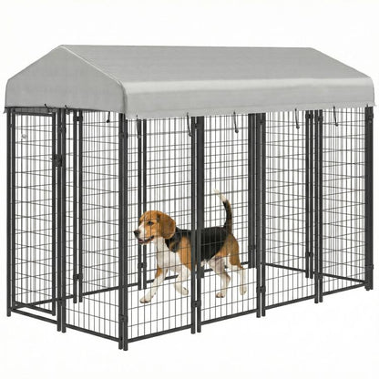 Outdoor dog kennel with gray roof and black wire mesh panels, front view