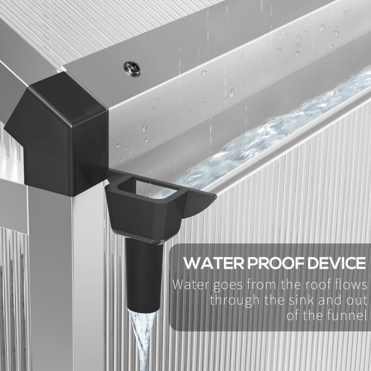 Rain gutter downspout on greenhouse frame, channeling roof runoff away