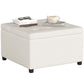 Beige square storage ottoman bench with padded top, button tufting, and hinged flip lid