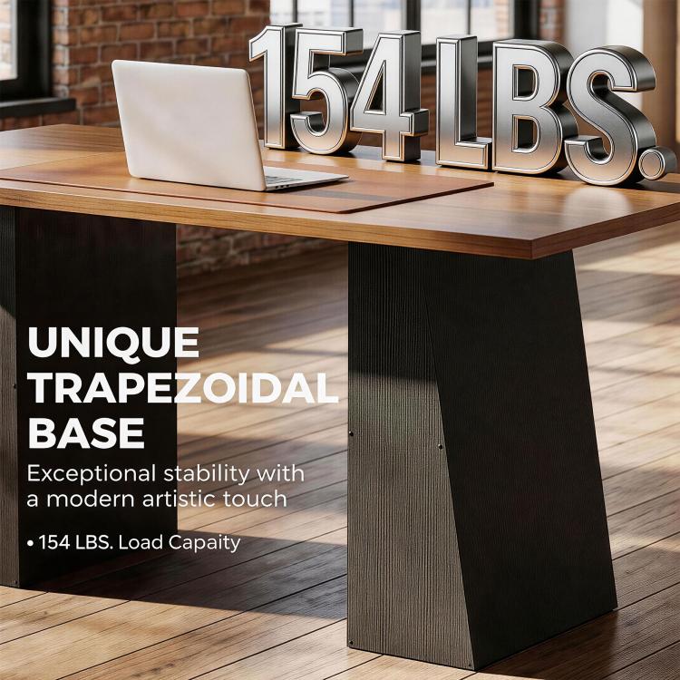 Light walnut computer desk with black trapezoidal base, close-up front view