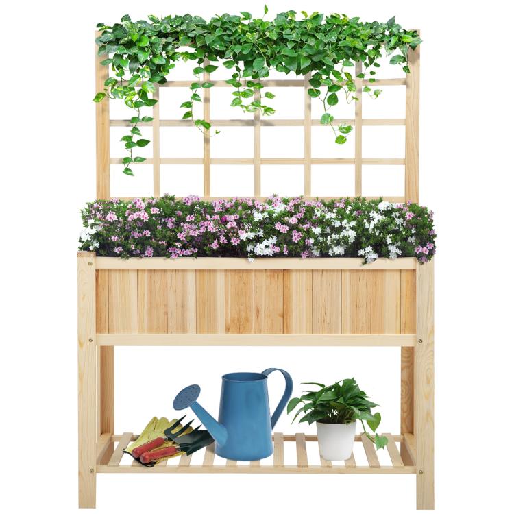 Wooden raised garden bed planter with trellis, filled with flowers and leafy greens
