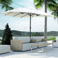 Beige patio umbrella open over patio seating, central dark pole with weighted base