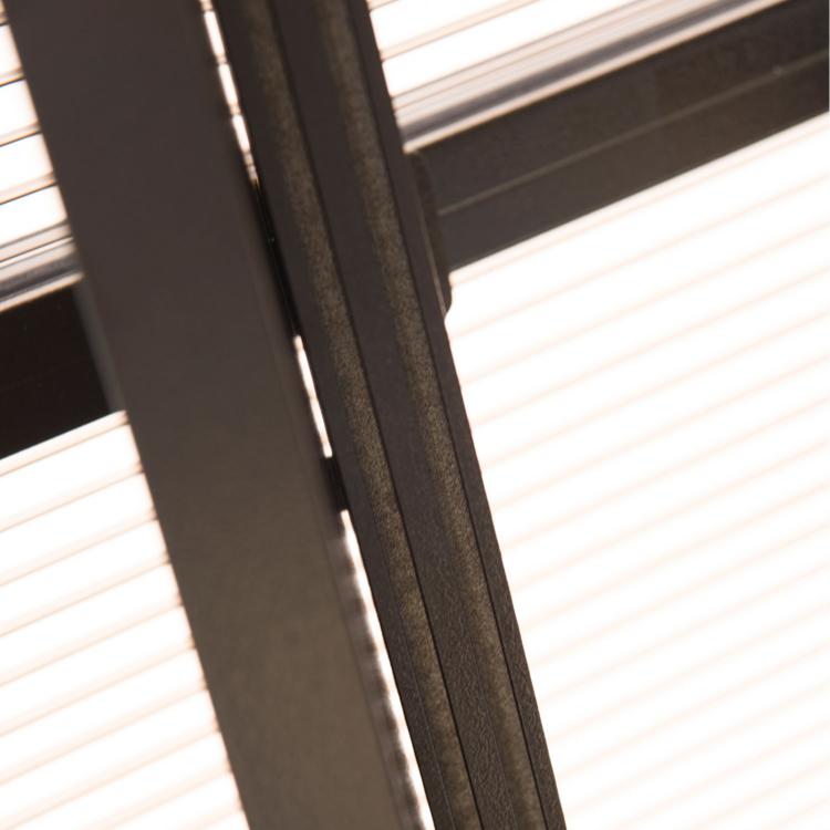 Gazebo curtain panel edge with black fabric and reinforced trim