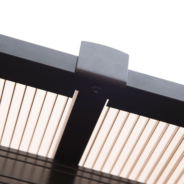 Close-up of black hardtop gazebo top beam with beige curtain fabric