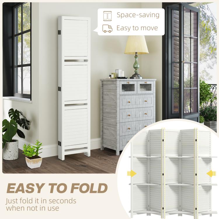 White tall folding privacy screen with shelf compartments beside a lamp and cabinet.