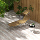 Tan outdoor chaise lounge chair with sun shade canopy and folding metal frame