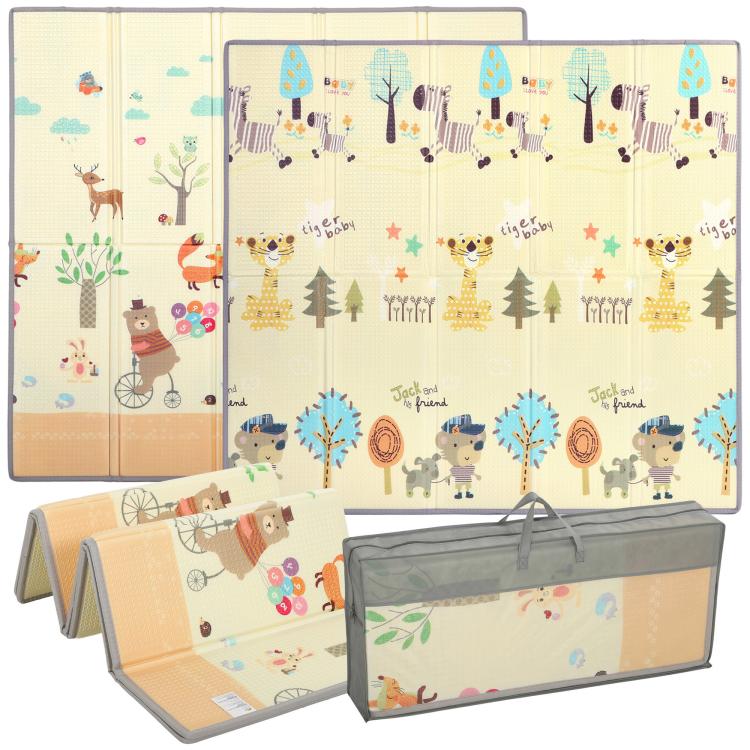 Reversible baby play mat with forest animal print, folded for storage, beige and blue