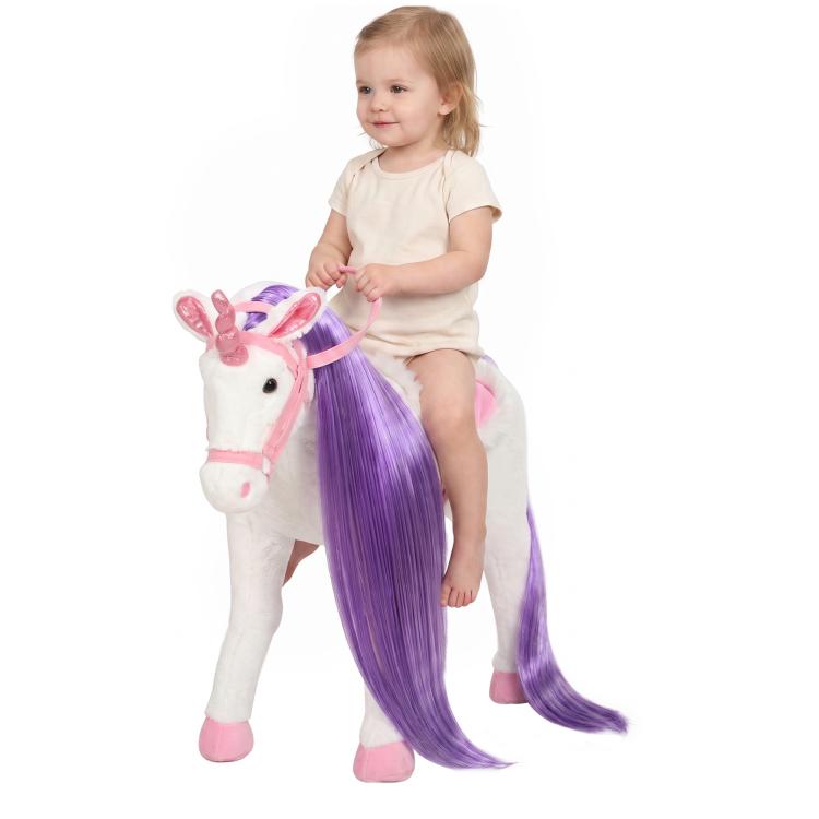 White plush ride-on horse toy with purple braided mane and pink saddle
