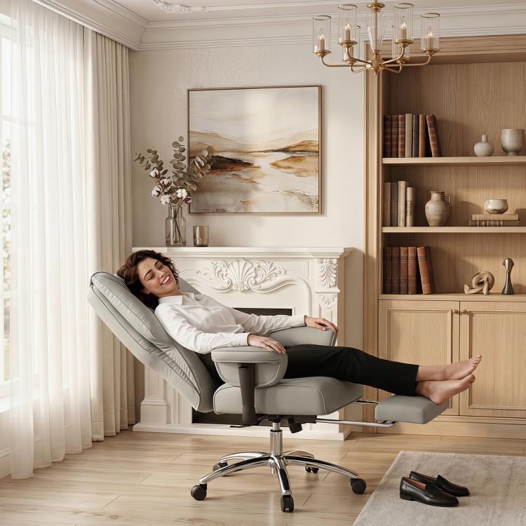 Light gray faux leather office chair with high back and reclining support