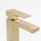 Brushed gold single-hole bathroom faucet with flat rectangular spout and lever.