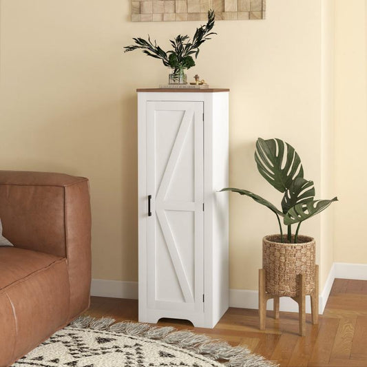 White floor storage cabinet with barn door, dark handle, and recessed panel detailing.
