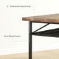 Side view showing thick brown tabletop and firm black steel frame