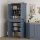 Navy blue pantry cabinet with adjustable shelves, doors, and drawer in use