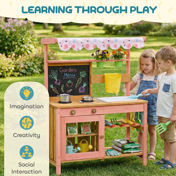 Pink wooden kids mud kitchen playset with canopy, chalkboard panel and cooking area