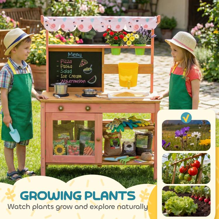 Kids using outdoor wooden mud kitchen with canopy, chalkboard menu, sink and planters