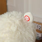 White plush alpaca rocking horse head with soft ears