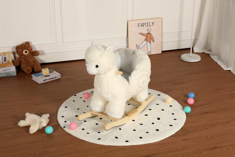 White plush alpaca rocking toy seated with wooden rocker base