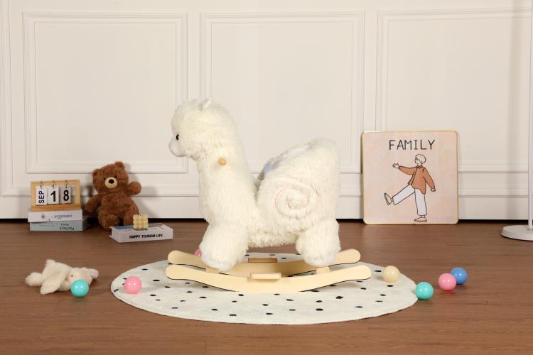 White plush alpaca rocking toy with arched neck and wooden rocker base