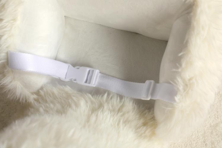 White plush alpaca rocking horse safety belt across seat