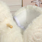 White plush alpaca rocking horse seat with safety belt and wooden support