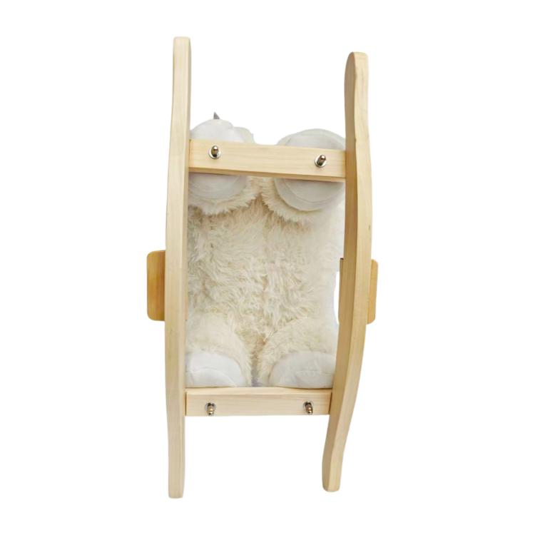 Wooden rocking frame with white plush rocking horse cover