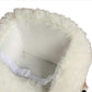 White plush rocking horse seat interior with safety strap