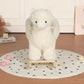 White plush alpaca rocking horse toy with wooden base, plush face and legs