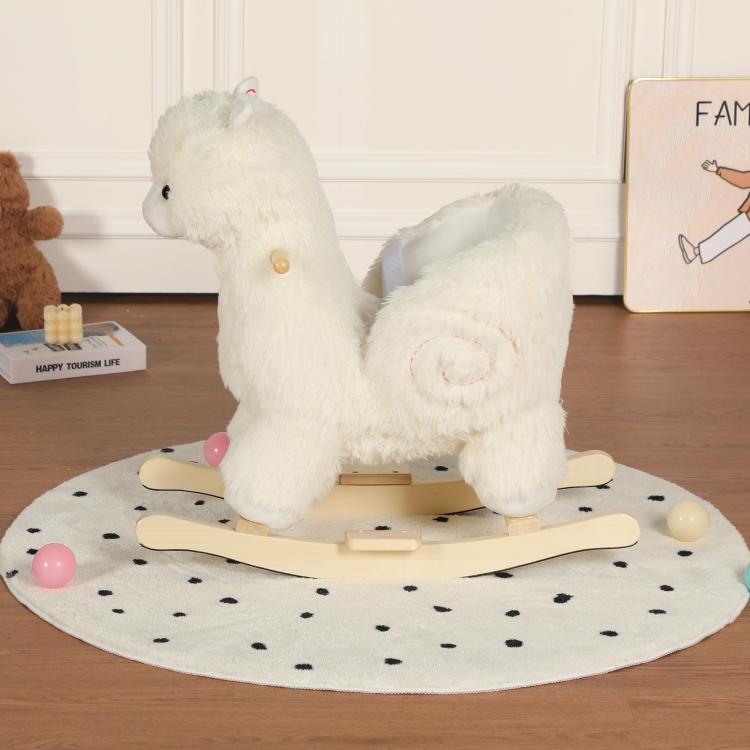 White plush alpaca rocking horse toy viewed from side on wooden rockers