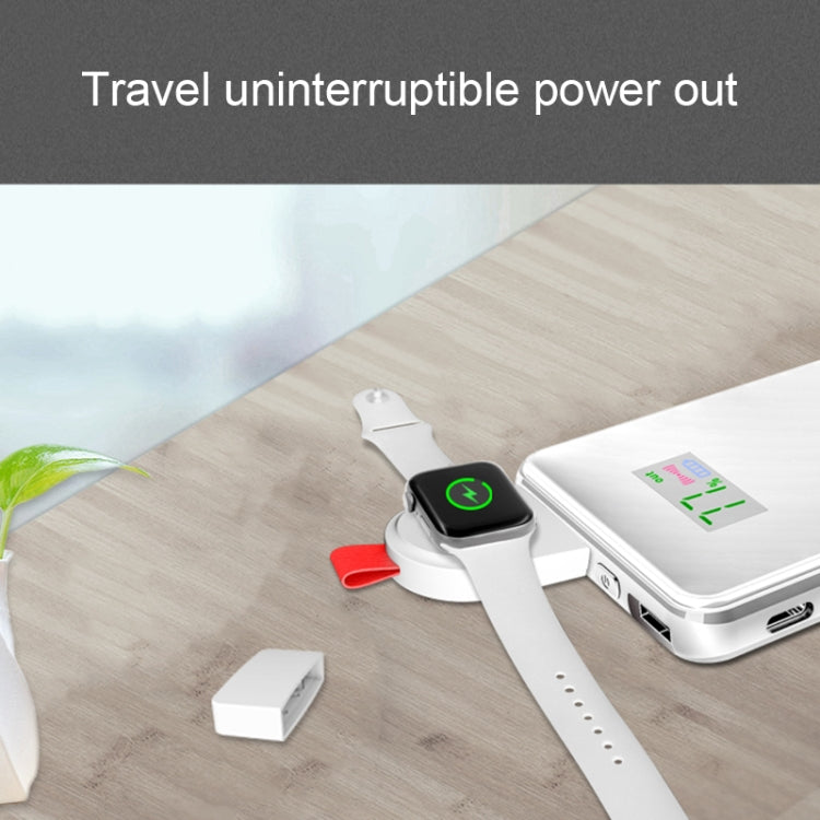 White portable charging dock with red strap and Apple Watch mounted