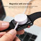 White magnetic charging puck connected to Apple Watch charging port