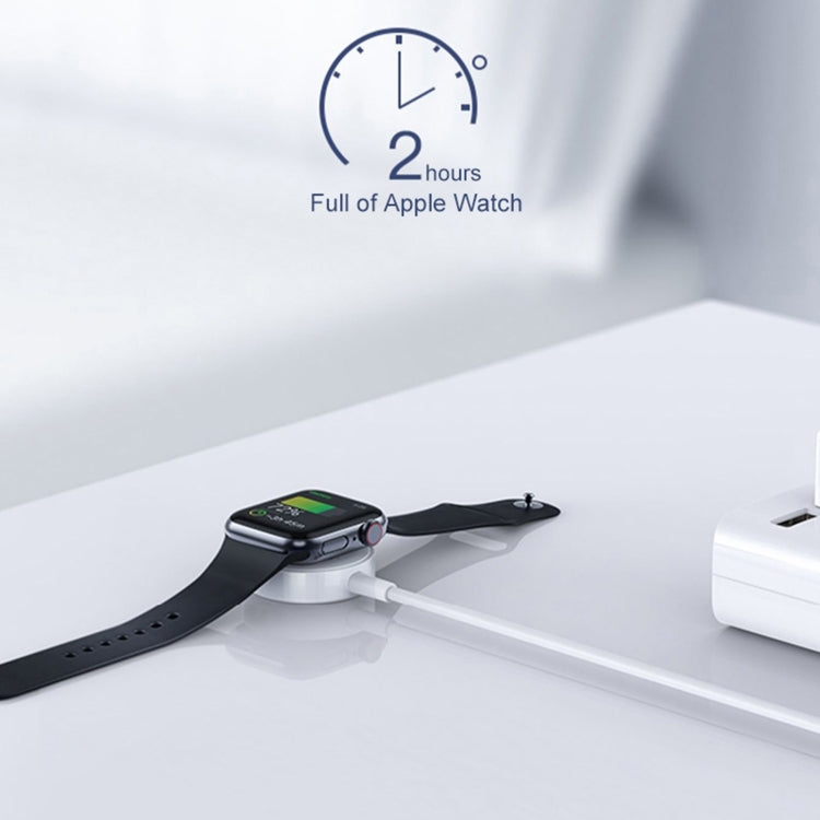 Apple Watch charging with magnetic cable puck and USB-C power source
