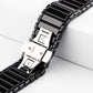 Black ceramic Apple Watch band with silver clasp and detailed link fasteners