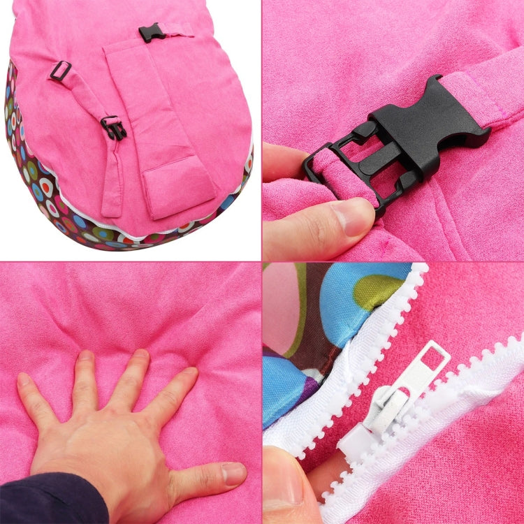 Pink bean bag cover close-up of straps, buckles, and black fastening tabs