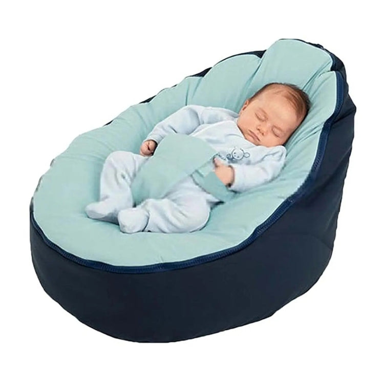Blue bean bag cover with light aqua top and dark navy sides, baby lying inside
