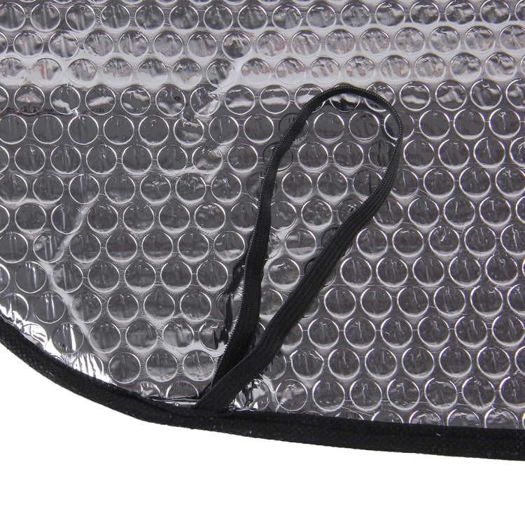 Silver reflective sun visor panel with black strap, bubble-texture insulation layer