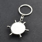 Silver compass-wheel keychain charm with key ring and four spokes, white face