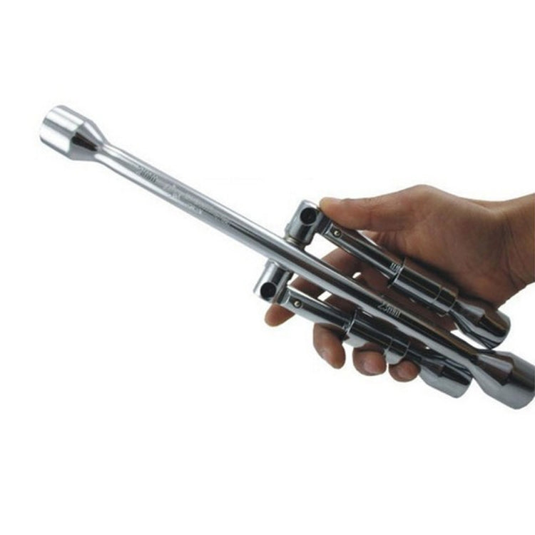 Foldable cross wrench in hand, chrome finish with multiple socket ends