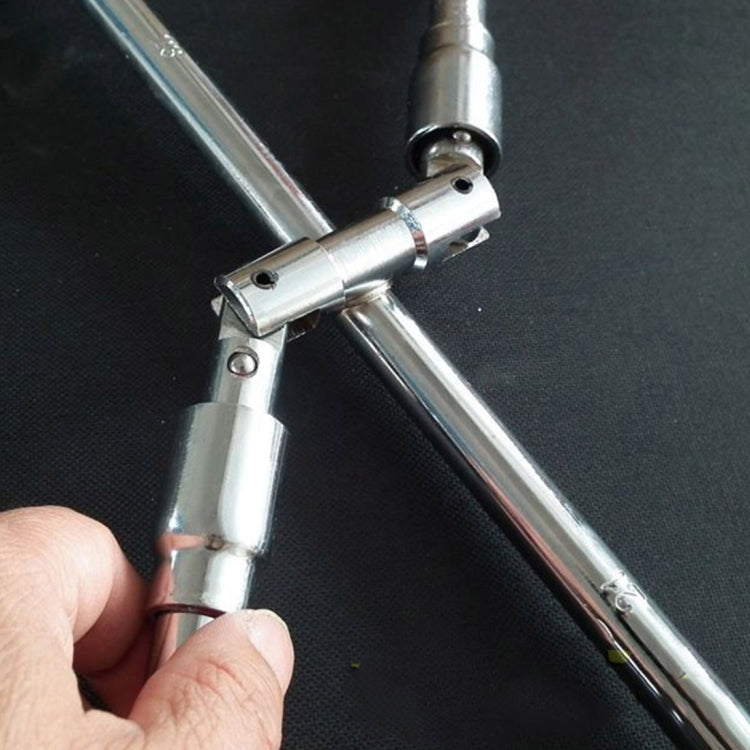 Foldable cross wrench hinge mechanism with socket attachment and handle joint