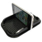 Black punctate phone slip mat with hinged phone cradle, textured base