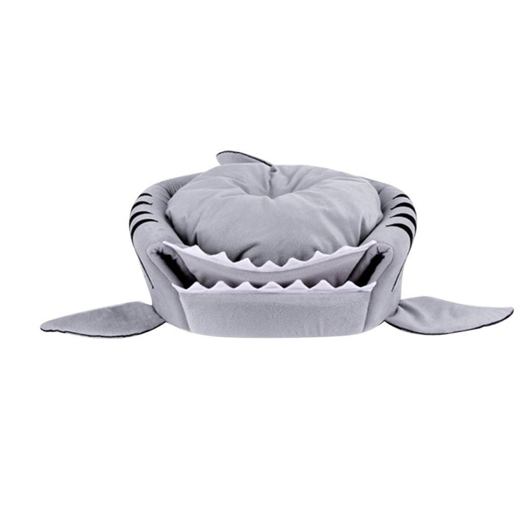 Grey shark-shaped pet sleeping pod with open mouth, plush rim, and side flaps