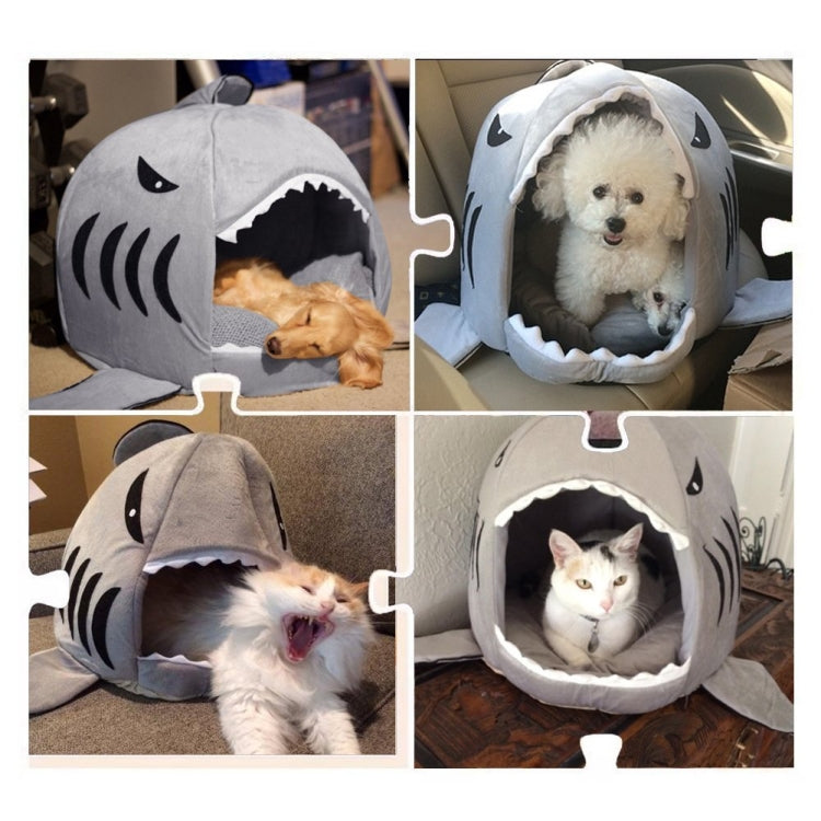 Grey shark-shaped pet bed with open front and side fins in use