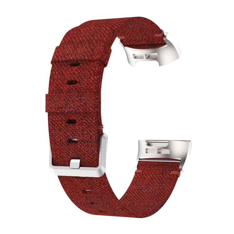 Dark red woven nylon watch band with metal clasp buckle, side view