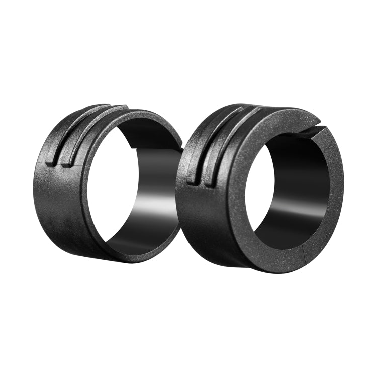 Pair of dark handlebar clamp rings with screw grooves for bike mounting